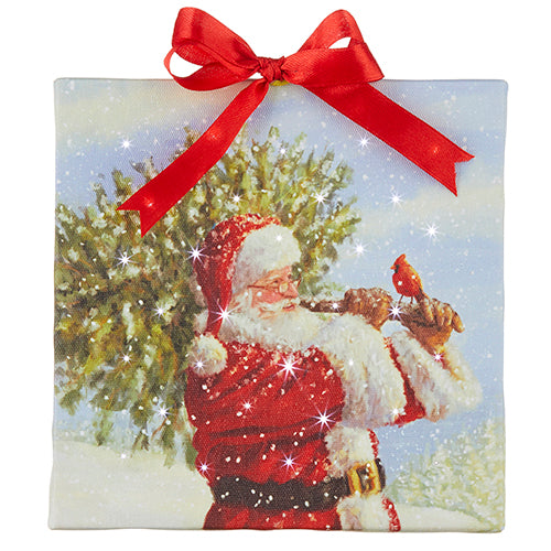 Santa Carrying Christmas Tree Lighted Print Ornament with Easel Back